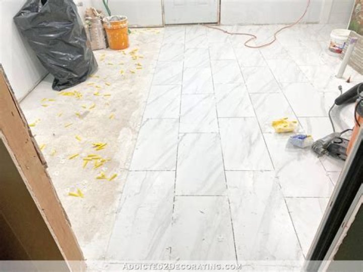Can you use tile mortar to level a floor?