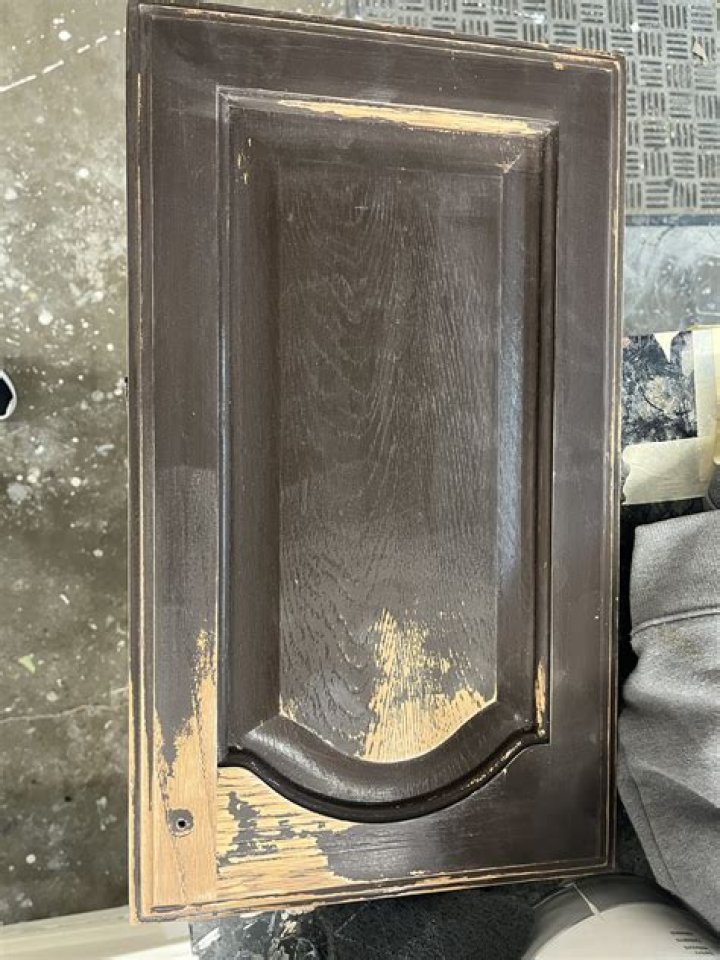 Do you have to strip cabinets before painting?