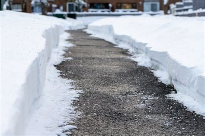 How do I get thick ice off my sidewalk?