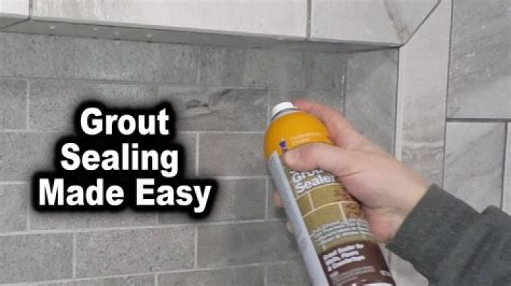 How do you get dried grout off of stone tile?