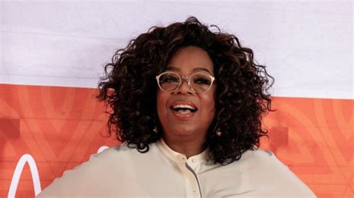 How old was oprah Winfrey when she became a billionaire?