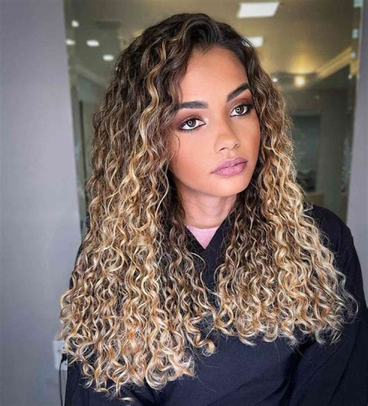 Is curly hair unprofessional?