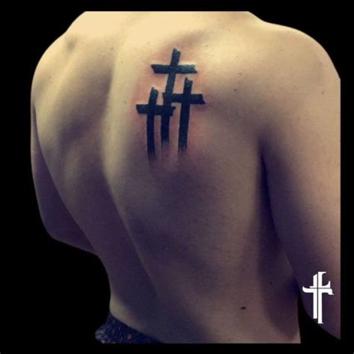 What does 3 crosses tattoo mean?