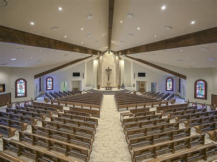 What does the red light in a Catholic church mean?