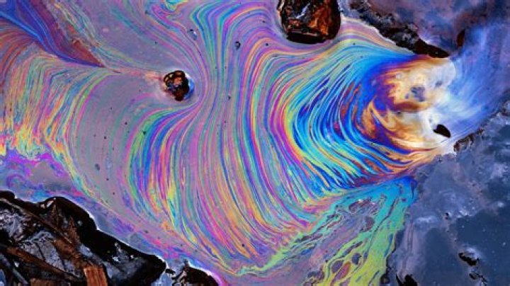 Why does oil explode with water?