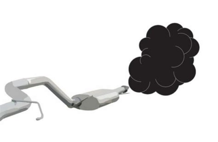 Why is my car blowing black smoke when I accelerate?